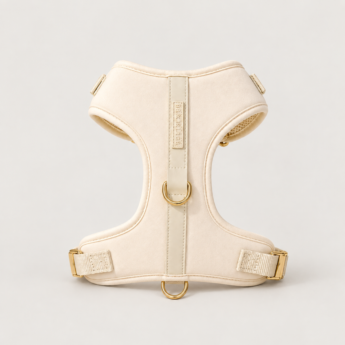 Bone Signature Harness front view on a pale warm-gray background