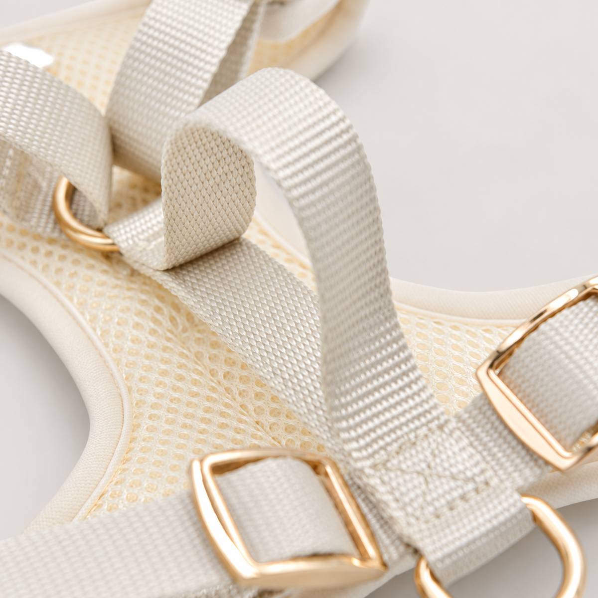 Bone Signature Harness handle view on a pale warm-gray background