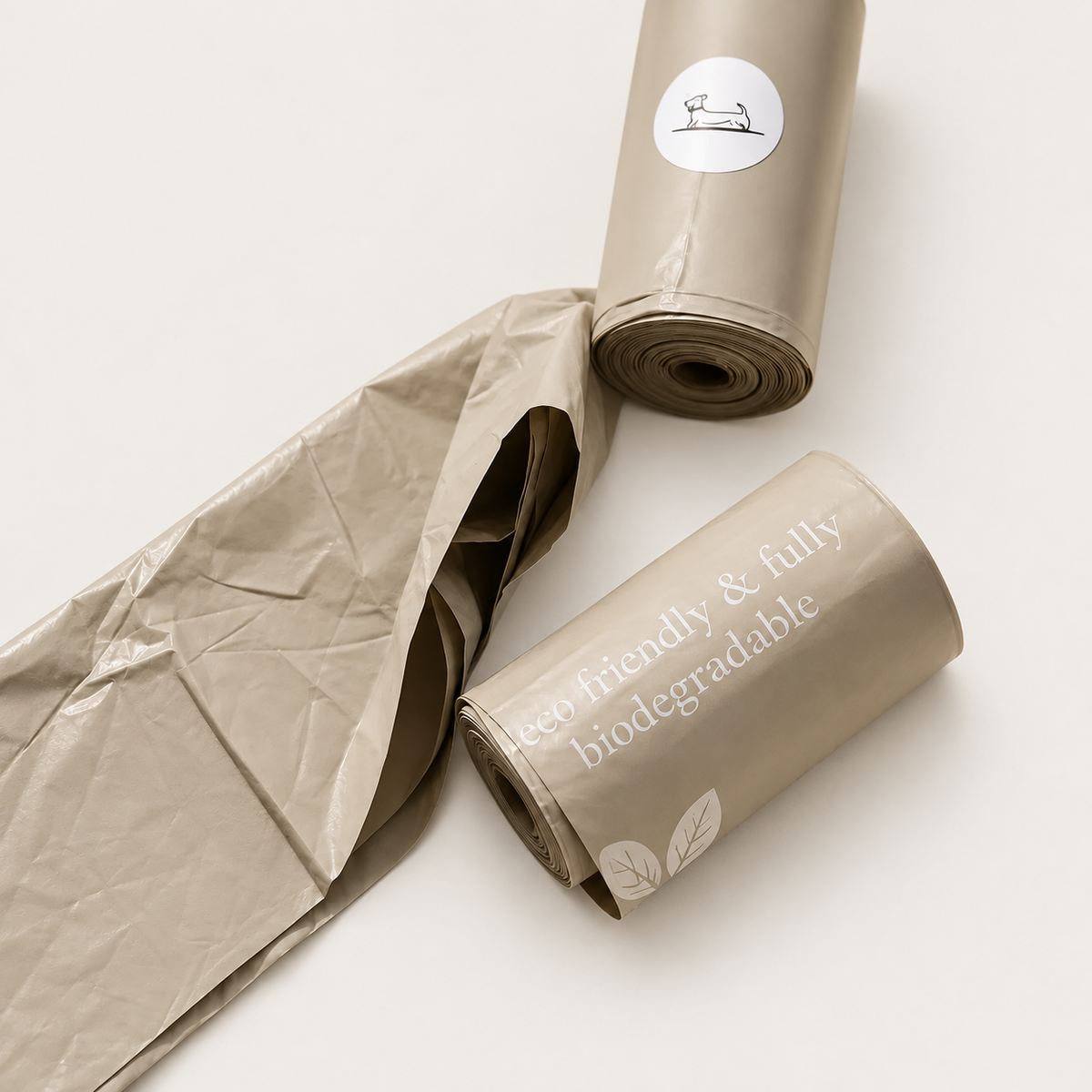 Waste bag rolls and open bag detail on a pale neutral background